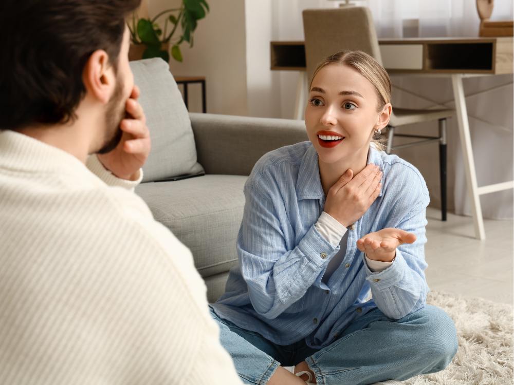Couple having sincere conversation about apology and forgiveness